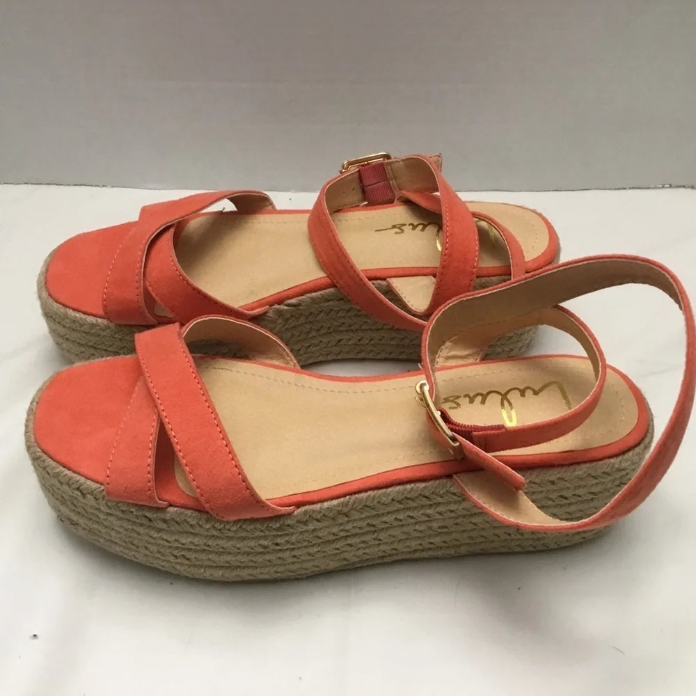 Lulu's strappy orange slippers